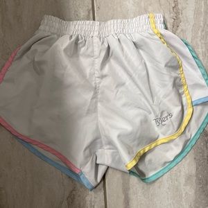 Tylers shorts size XS with blue teal yellow and pink on sides